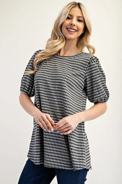 Plus size black and white gingham print top with puff sleeves and peplum hem