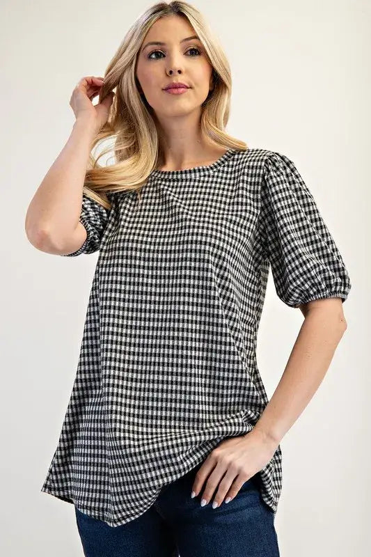 Black and white gingham print plus size blouse with puff sleeves and relaxed fit