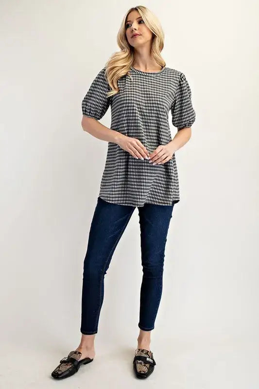 Plus size black and white gingham print top with puff sleeves and short sleeves