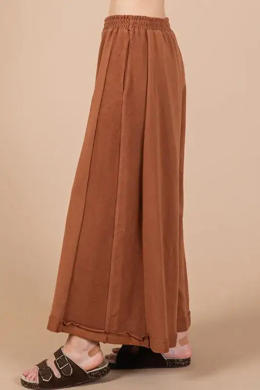 Brown wide-leg palazzo pants with elastic waistband and ankle-length hem for casual wear