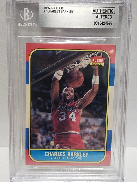 Graded Charles Barkley 1986 Fleer card in BGS Authentic Altered with player in red jersey