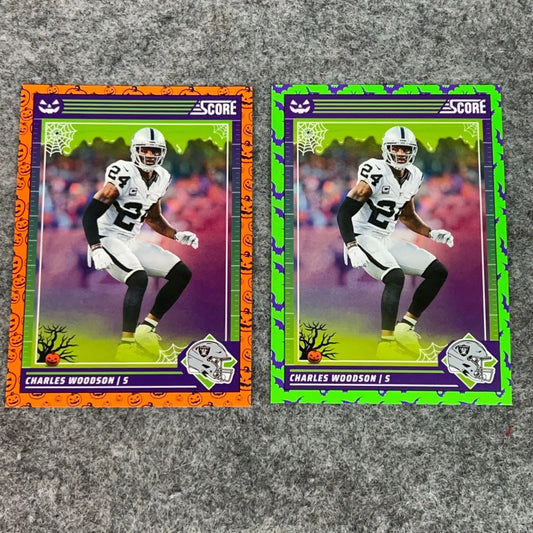 Two Halloween-themed Charles Woodson Raiders football trading cards in a 2024 NFL set
