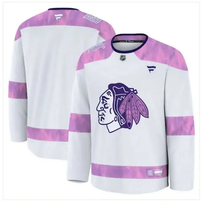 White Chicago Blackhawks hockey jersey with pink camouflage accents for Hockey Fights Cancer