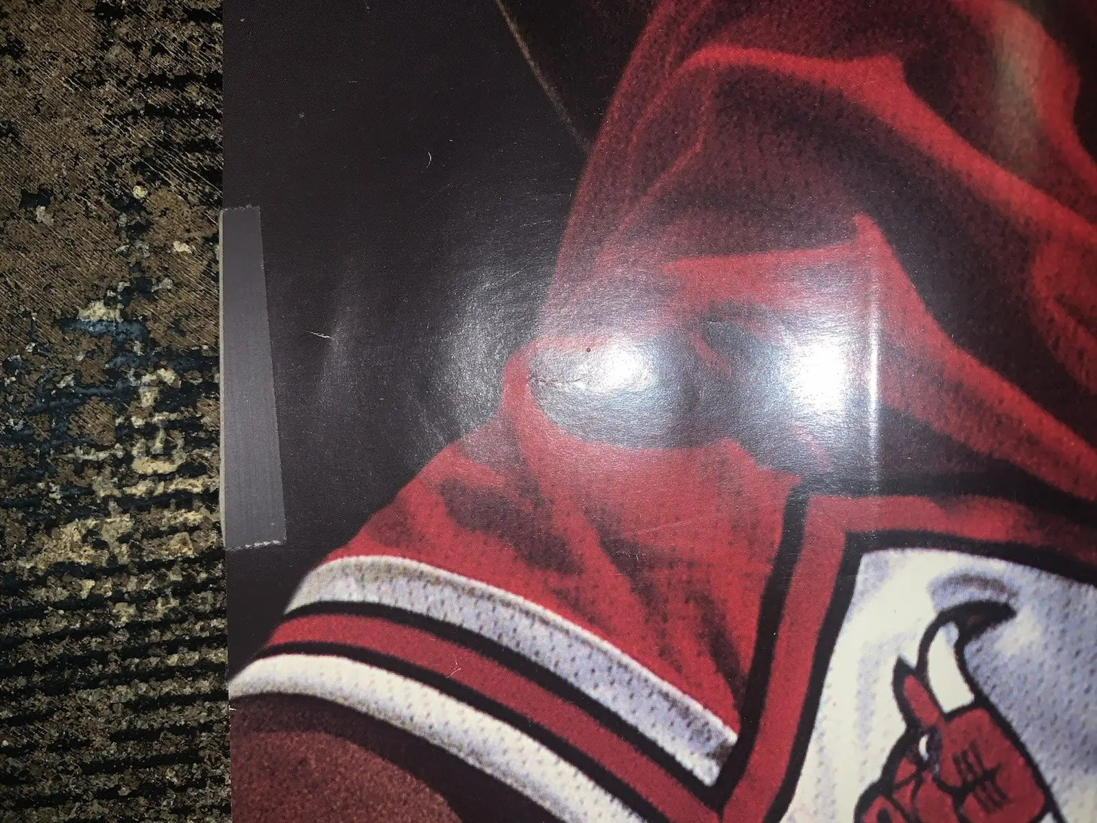 Chicago Bulls sports memorabilia featuring a red and white jersey with a bull logo