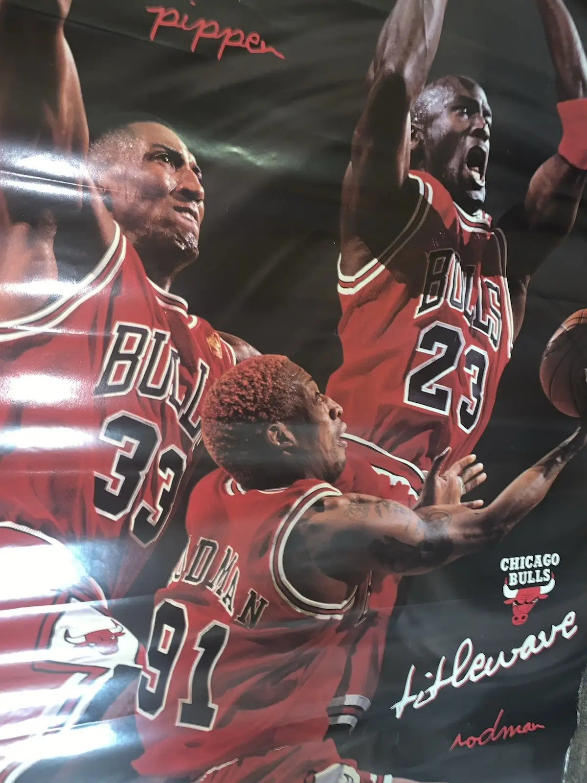 Vintage Chicago Bulls poster featuring Michael Jordan, Scottie Pippen, and Dennis Rodman sports memorabilia
