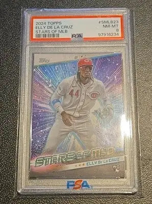 Graded Elly De La Cruz Cincinnati Reds baseball card with small writing inside the hat lot