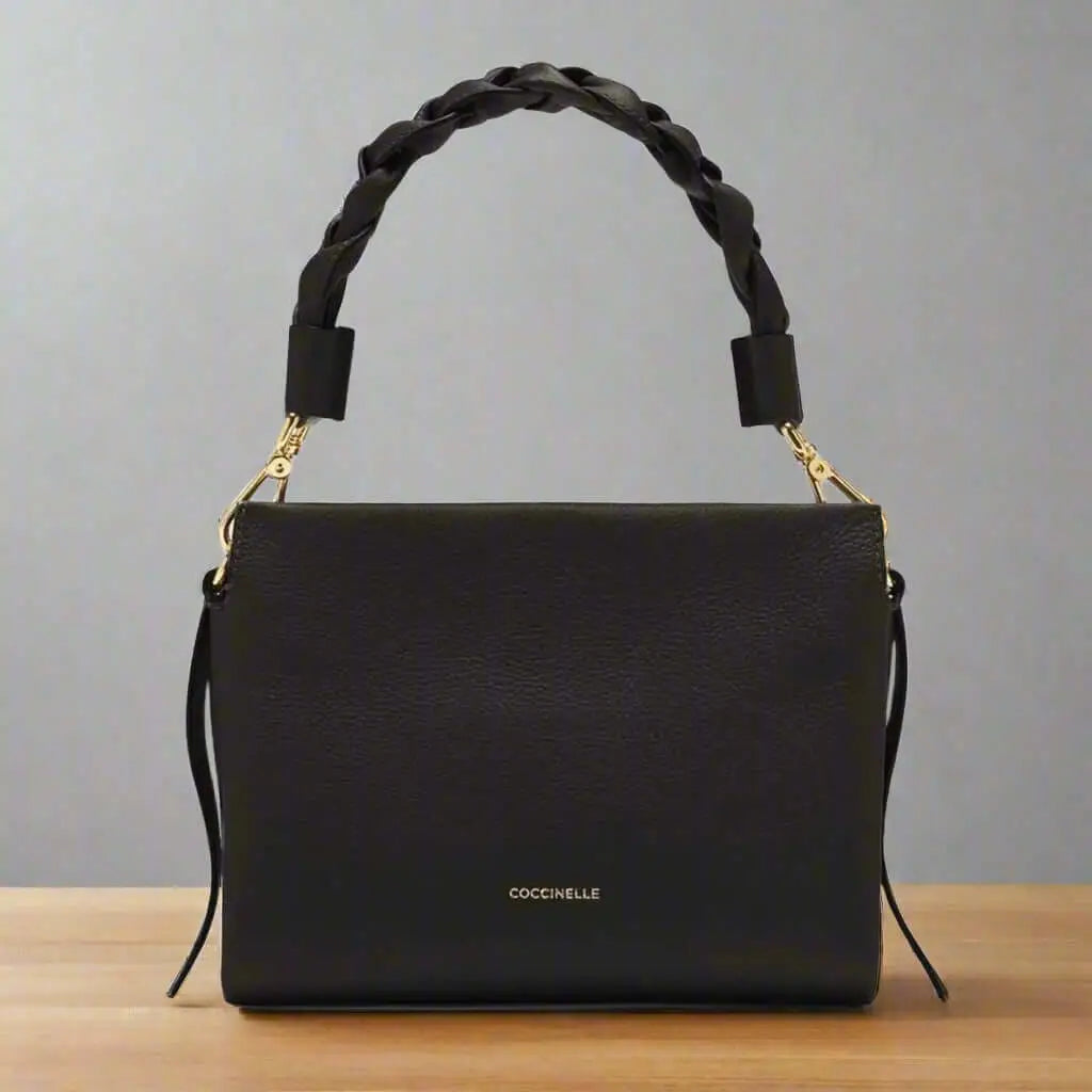 Black leather shoulder bag with braided handle from Coccinelle women’s handbags collection
