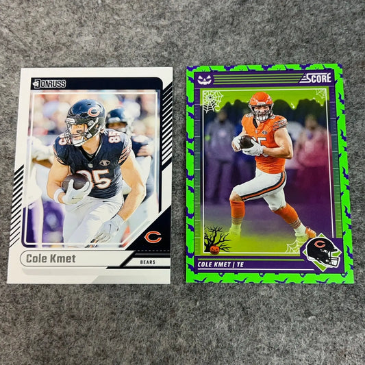 Two Cole Kmet Chicago Bears 2024 NFL football trading cards on display
