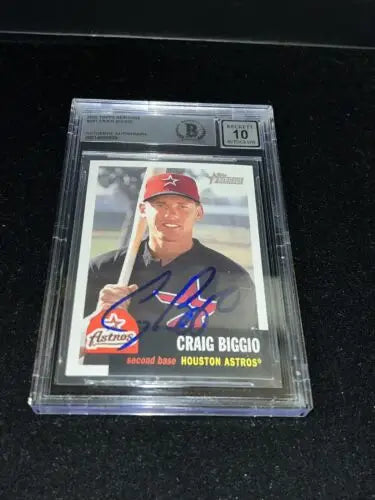 Encased Craig Biggio autographed baseball card from Topps Heritage for Houston Astros fans