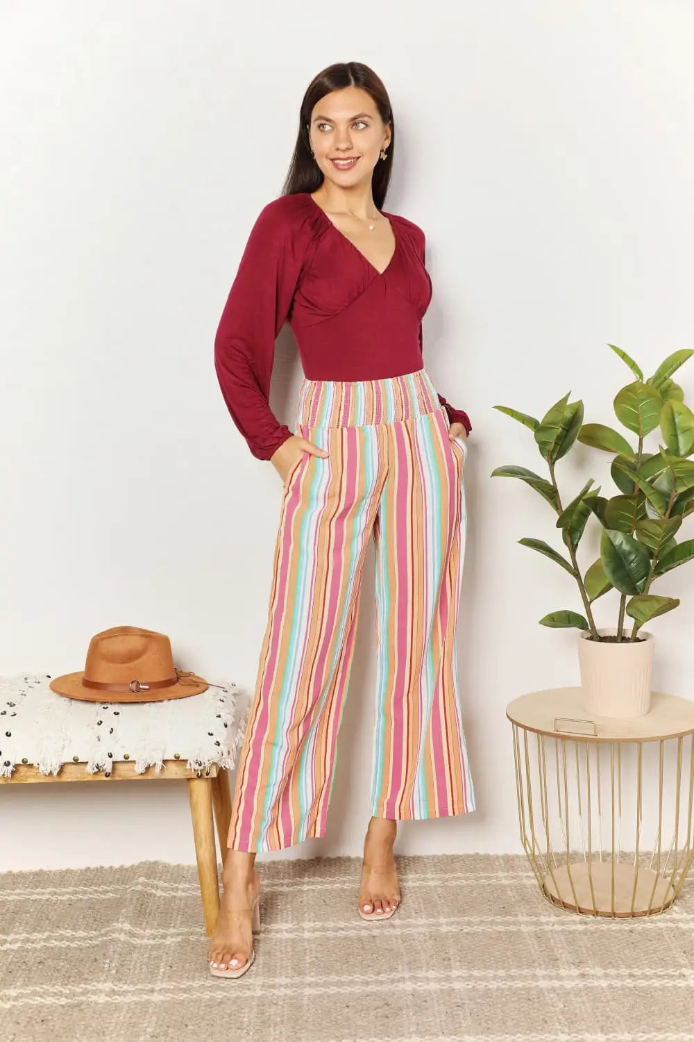 Culture Code vibrant striped high-waist pants paired with size V-Neck Bodysuit and poet sleeves