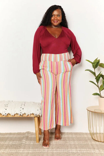 Culture Code wide-leg striped pants with high waist and vibrant colors paired with size v-neck bodysuit