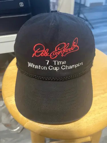 Black Dale Earnhardt 7 Time Champion SnapBack Hat with red embroidered text