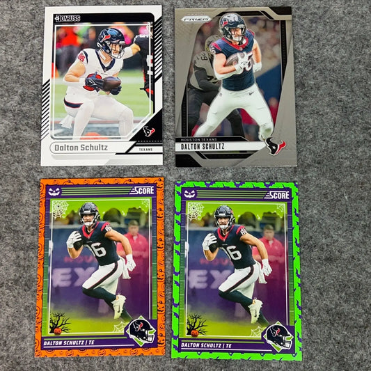 Four Dalton Schultz Houston Texans football trading cards in the 2024 Panini NFL set