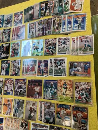 Collection of Dan Marino Miami Dolphins football trading cards, including Upper Deck and Topps