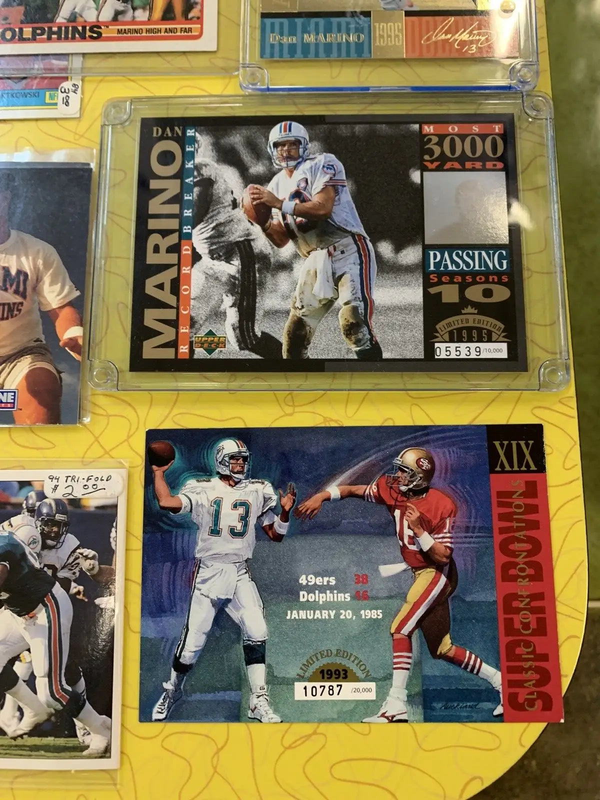 Dan Marino Miami Dolphins Card Lot featuring Upper Deck and Topps NFL trading cards