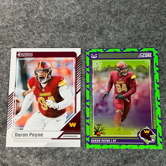Two Daron Payne Washington Commanders 2024 NFL football trading cards displayed