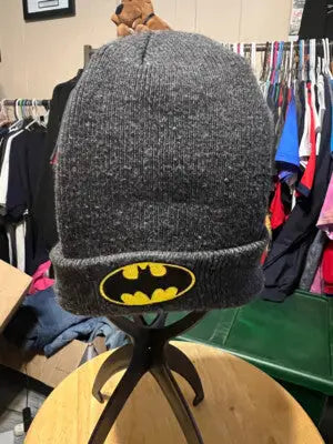 Dark gray Batman beanie hat with yellow and black Batman logo for Batman beanie fans
