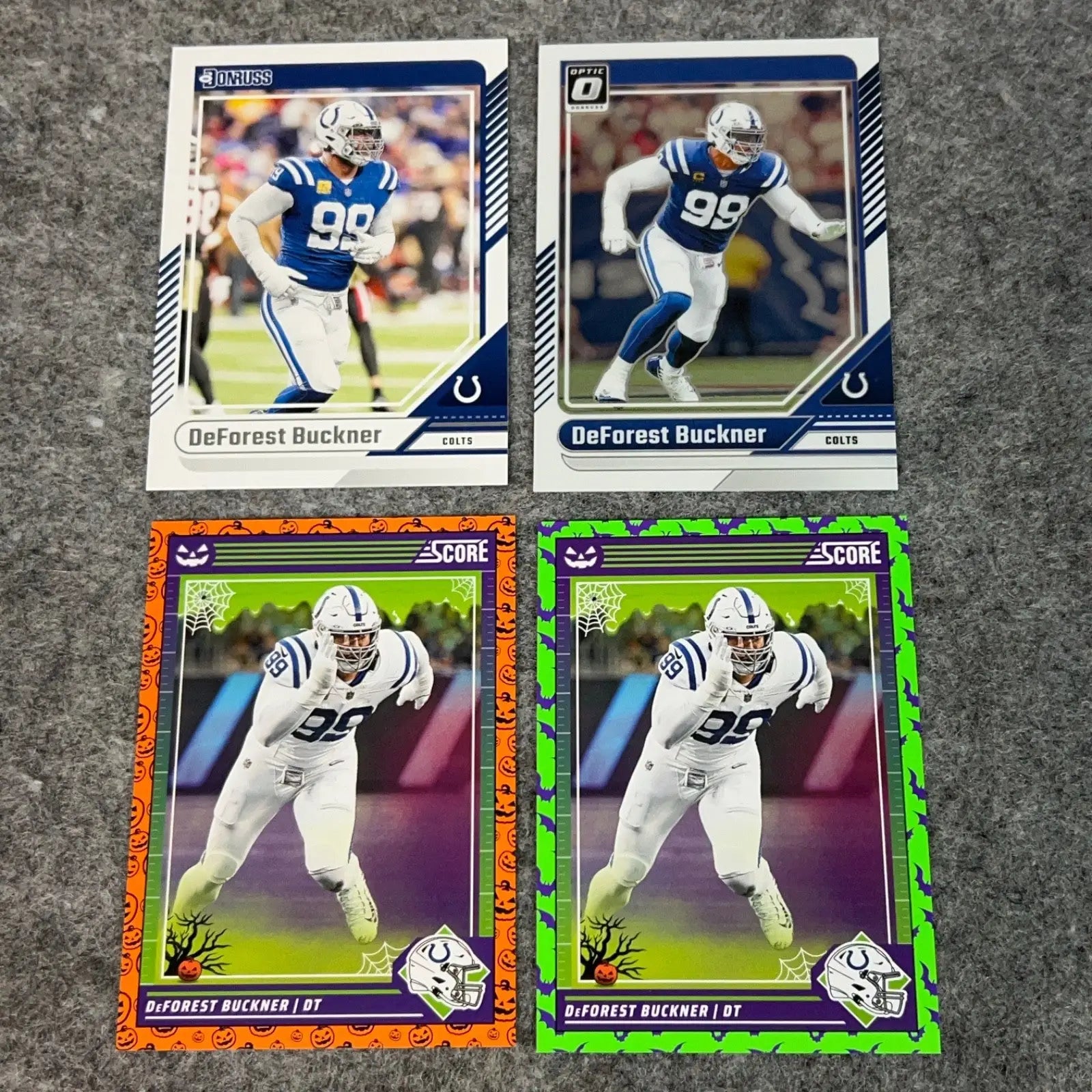 Four collectible DeForest Buckner Indianapolis Colts football cards from the 2024 NFL Panini series
