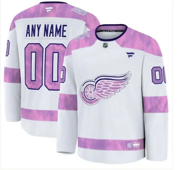 White hockey jersey with pink accents from Detroit Red Wings 2024 Cancer Awareness Collection