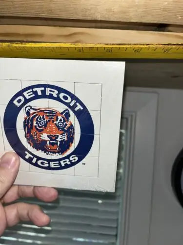 Detroit Tigers logo sticker from game puzzle and trading cards collection