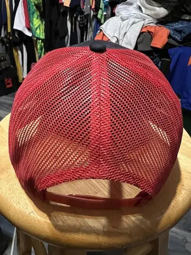 Red mesh-back Dirt Inc Trucker SnapBack Hat with black front panel and top button