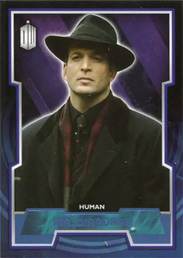 Man in dark fedora and coat on purple background, featured on Blue Foil Parallel Card