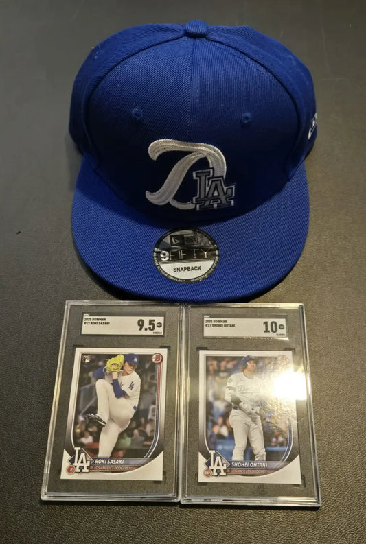Blue Los Angeles Dodgers cap with graded Roki Sasaki and baseball cards, Era 9FIFTY snapback