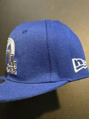 Blue baseball cap with white embroidered logo, Roki Sasaki, Era 9FIFTY Snapback