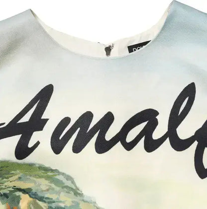White crew-neck dress with black cursive text, stylish mini dress from DOLCE GABBANA Amalfi collection