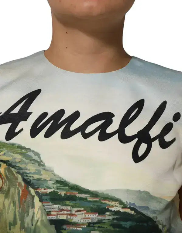 Light-colored mini dress with Amalfi scenic print and flowing script design