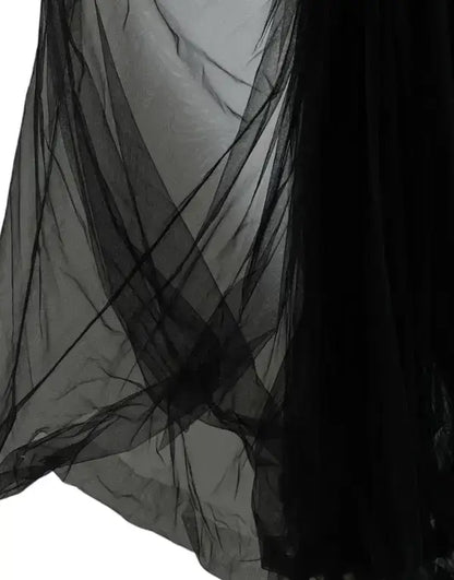 Sheer black tulle fabric with visible folds and layers for Dolce & Gabbana black sequined gown