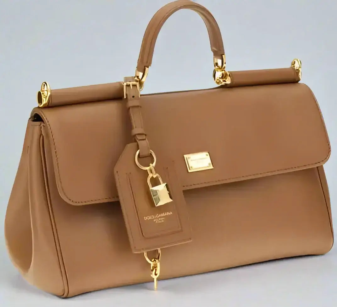 Brown leather Sicily handbag with gold hardware and detachable lock charm in Gabbana butterscotch leather
