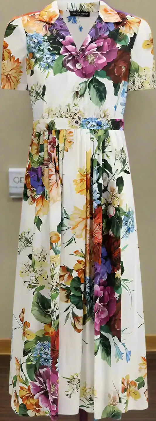 White floral midi dress with flower bouquet print, tie waist, and collared v-neck