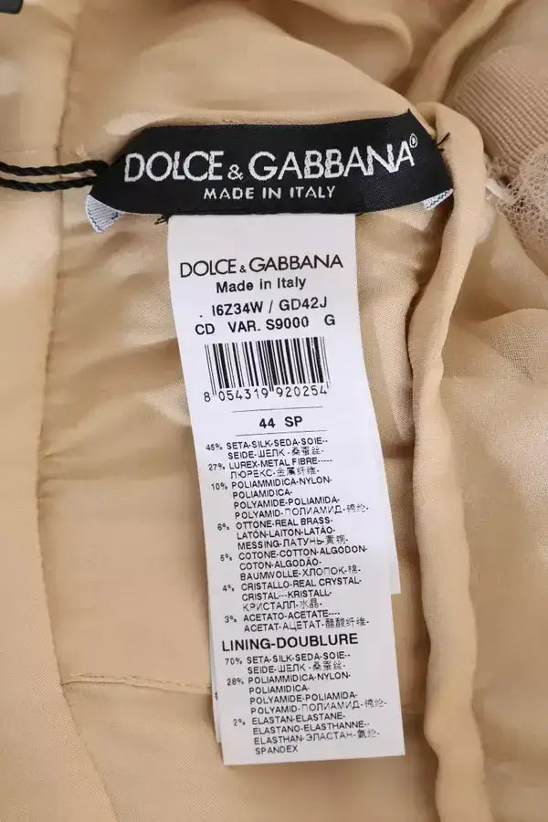 Dolce & Gabbana gold silk dress label with material and sizing info, crystal embellished design