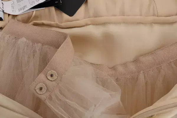 Beige tulle skirt with elastic waistband and buttons from Dolce Gabbana gold silk collection