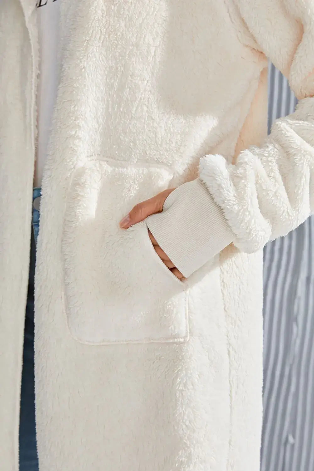 White fluffy hooded teddy bear jacket with pocket detail and gold trim for size hooded teddy