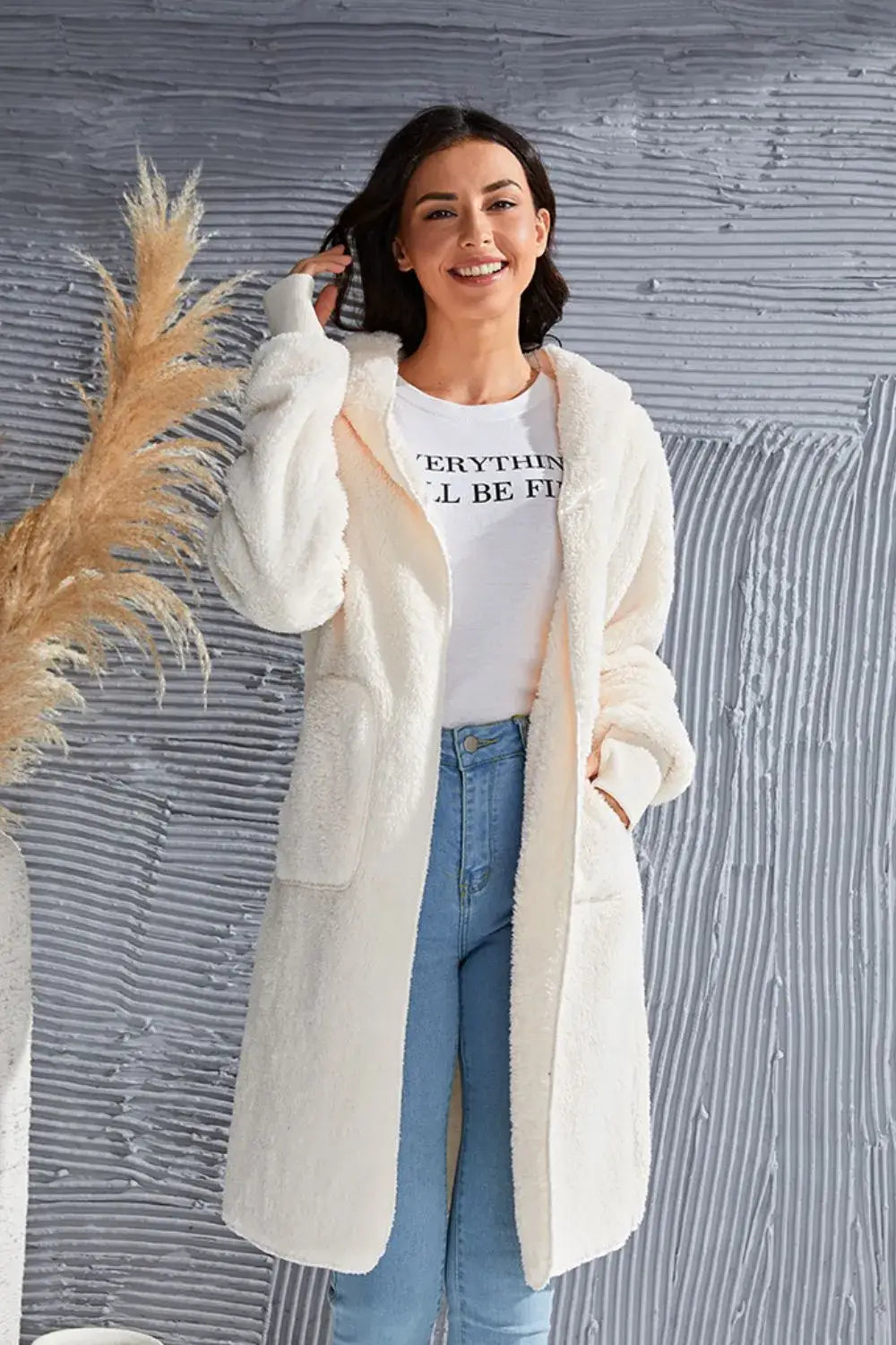 Cream oversized faux fur hooded teddy bear jacket with pockets and relaxed fit