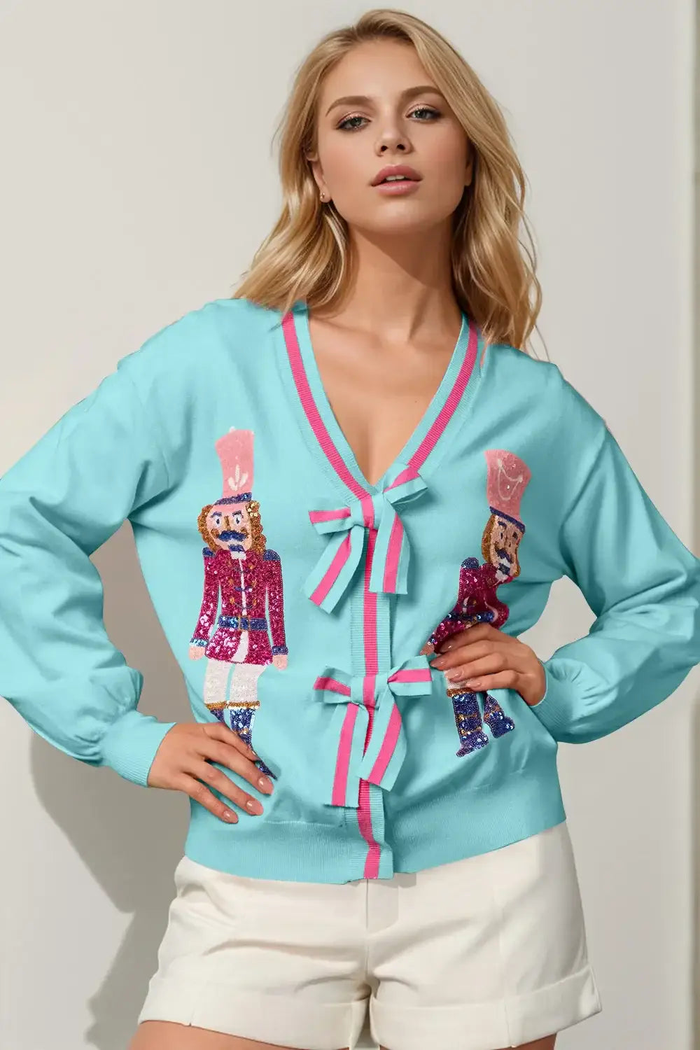 Double Take Full Size Nutcracker Sequin Bow Decor Cardigan - Pastel Blue / S/M - Apparel & Accessories > Clothing >