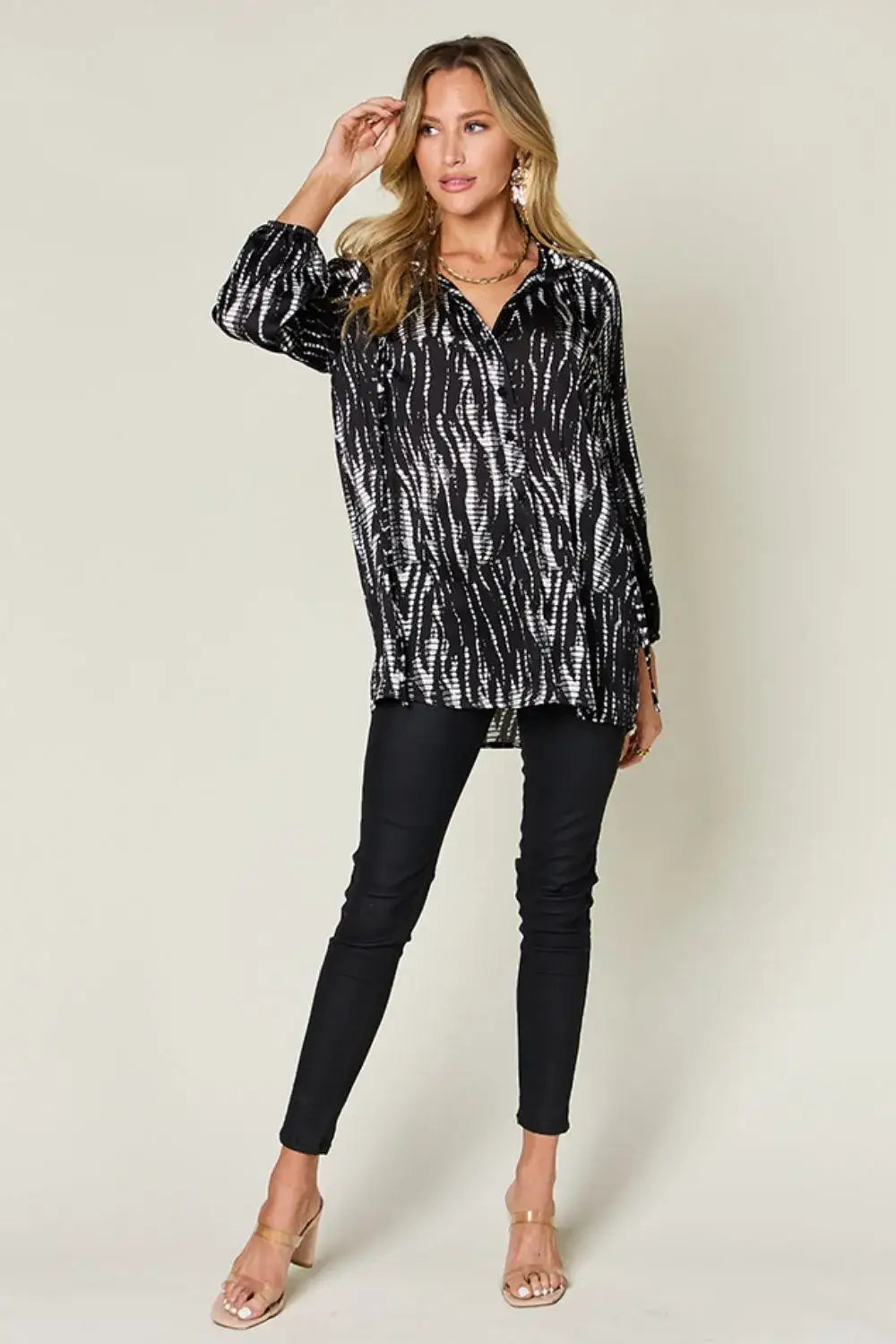 Black and white zebra print long sleeve shirt with size printed button details