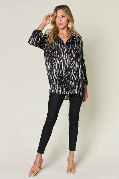 Black and white zebra print long sleeve shirt with size printed button details