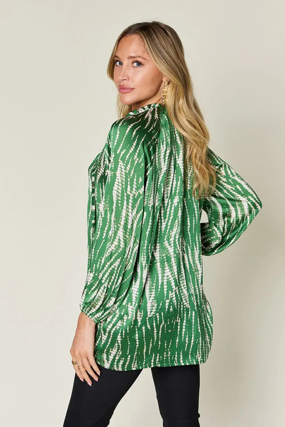 Green and white tie-dye long sleeve shirt with size printed button details for the Double Take collection
