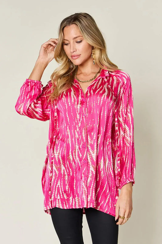 Pink and gold sequined long sleeve shirt with v-neck design and size printed details