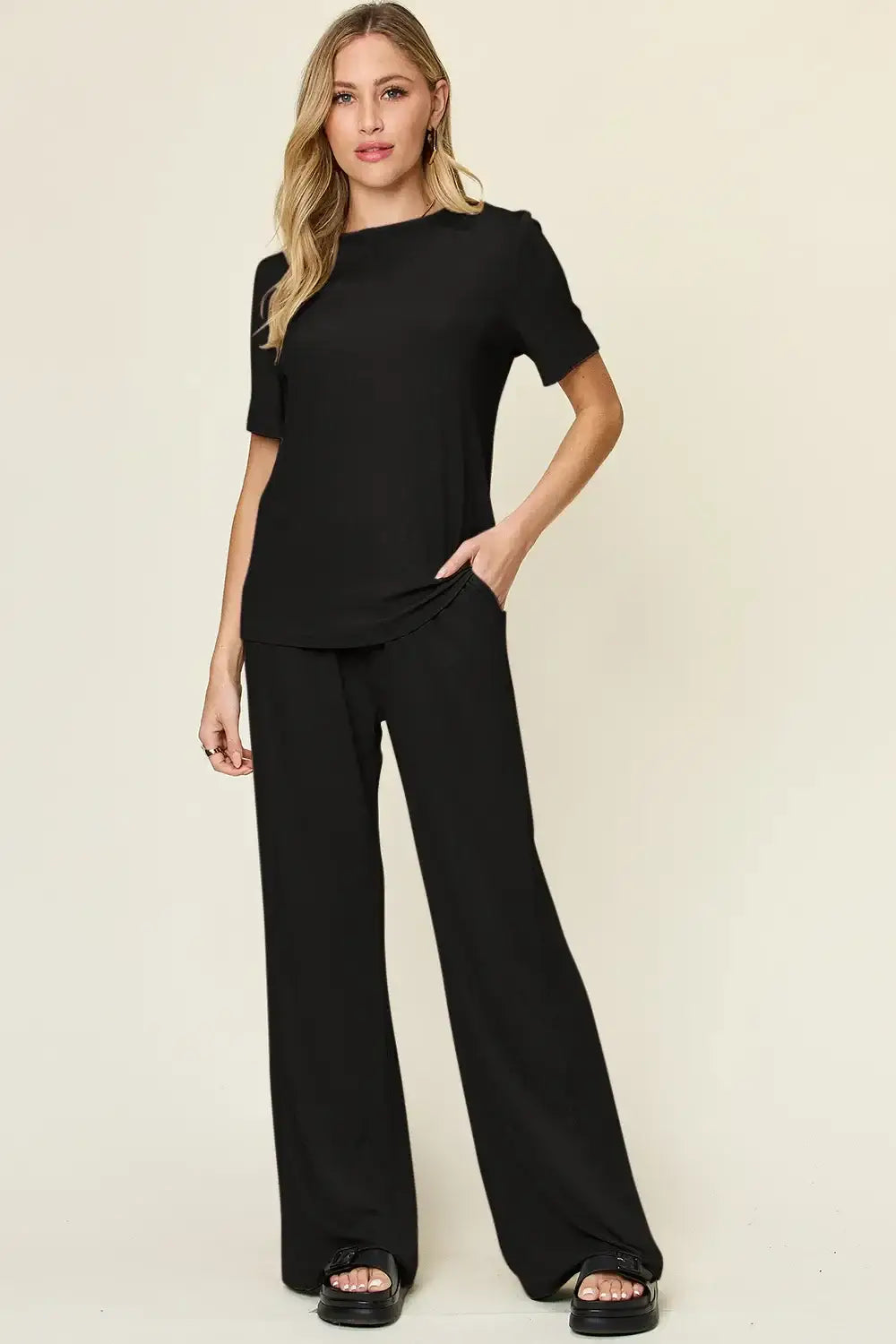 Black jumpsuit with wide leg pants and short-sleeved top from Double Take wide leg pants set