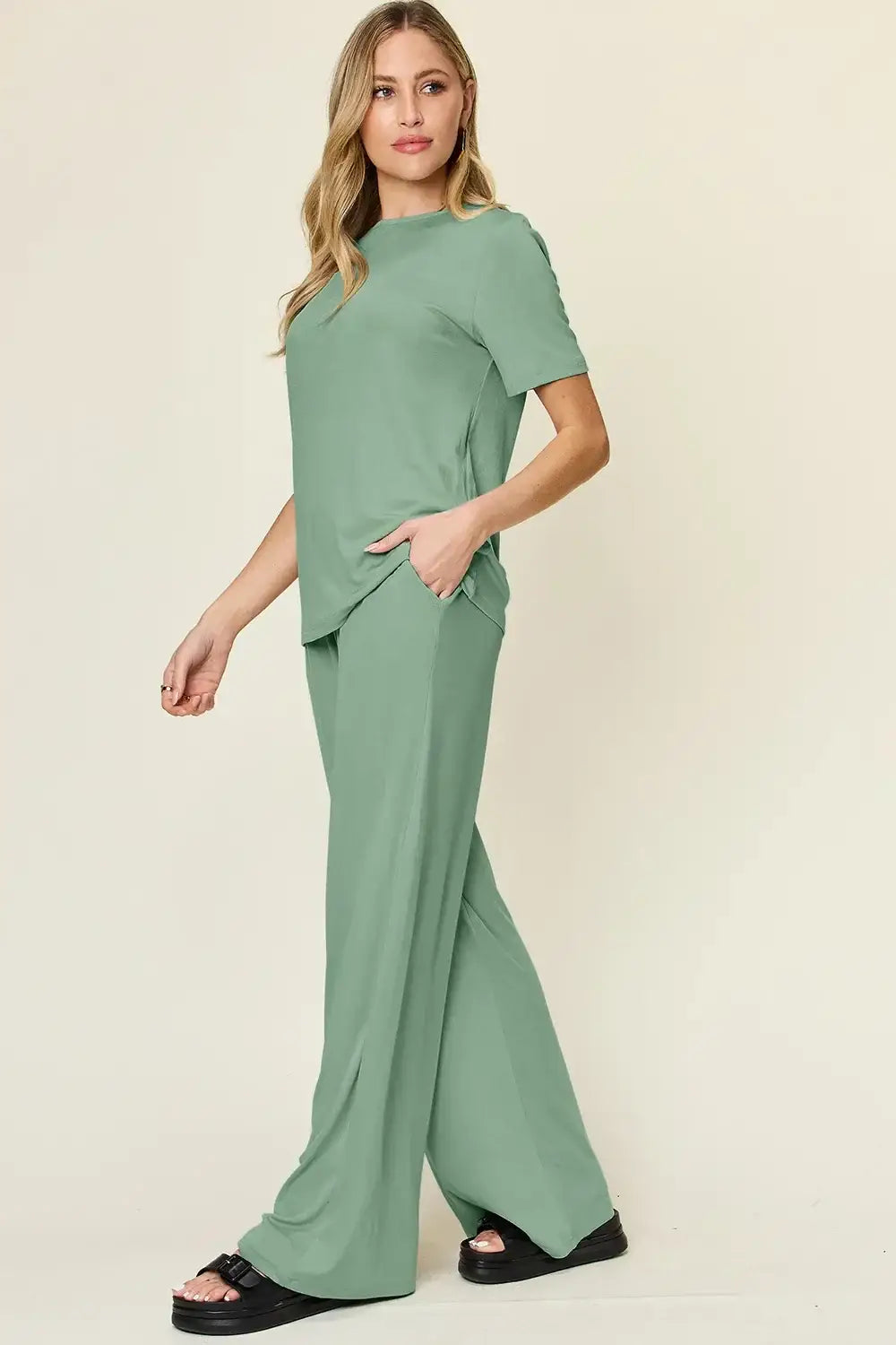 Sage green wide leg pants set with round neck short sleeve top and wide-leg design