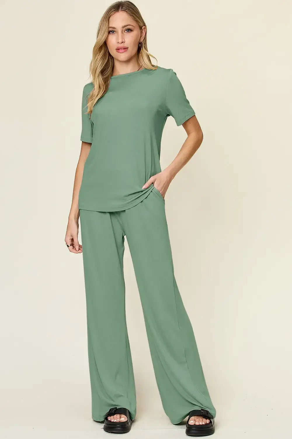 Sage green wide leg pants with relaxed fit and elastic waistband in wide leg pants set