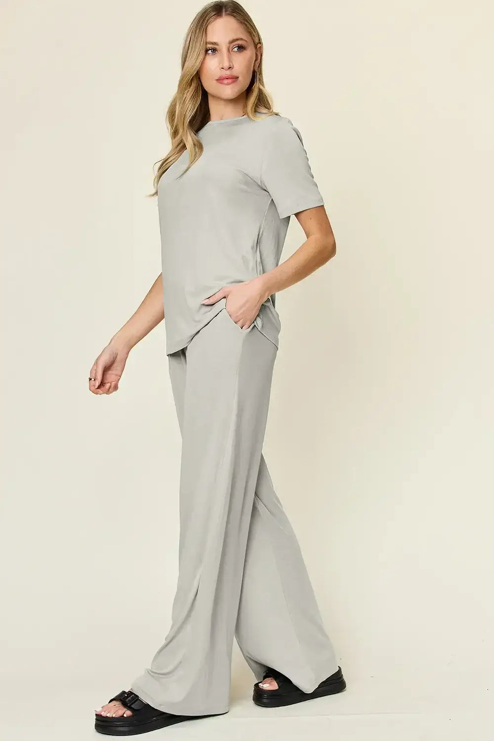 Light gray wide leg pants set with round neck short sleeve T-shirt and relaxed fit