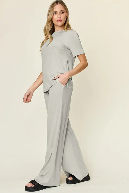 Light gray wide leg pants set with round neck short sleeve T-shirt and relaxed fit