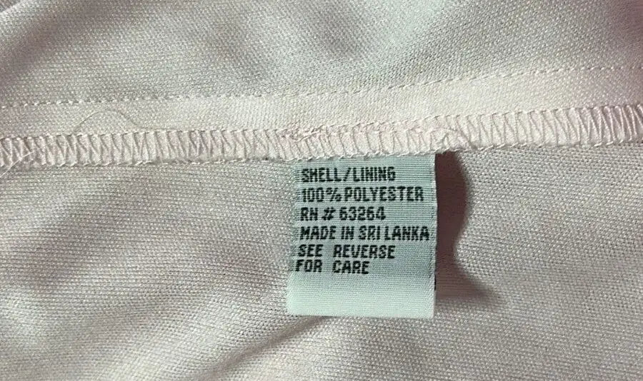 Light pink dress barn sheer floral dress with care tag for size 10P