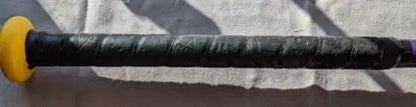 Worn black handle with yellow end of Easton Octane League Baseball Bat Youth 30/18