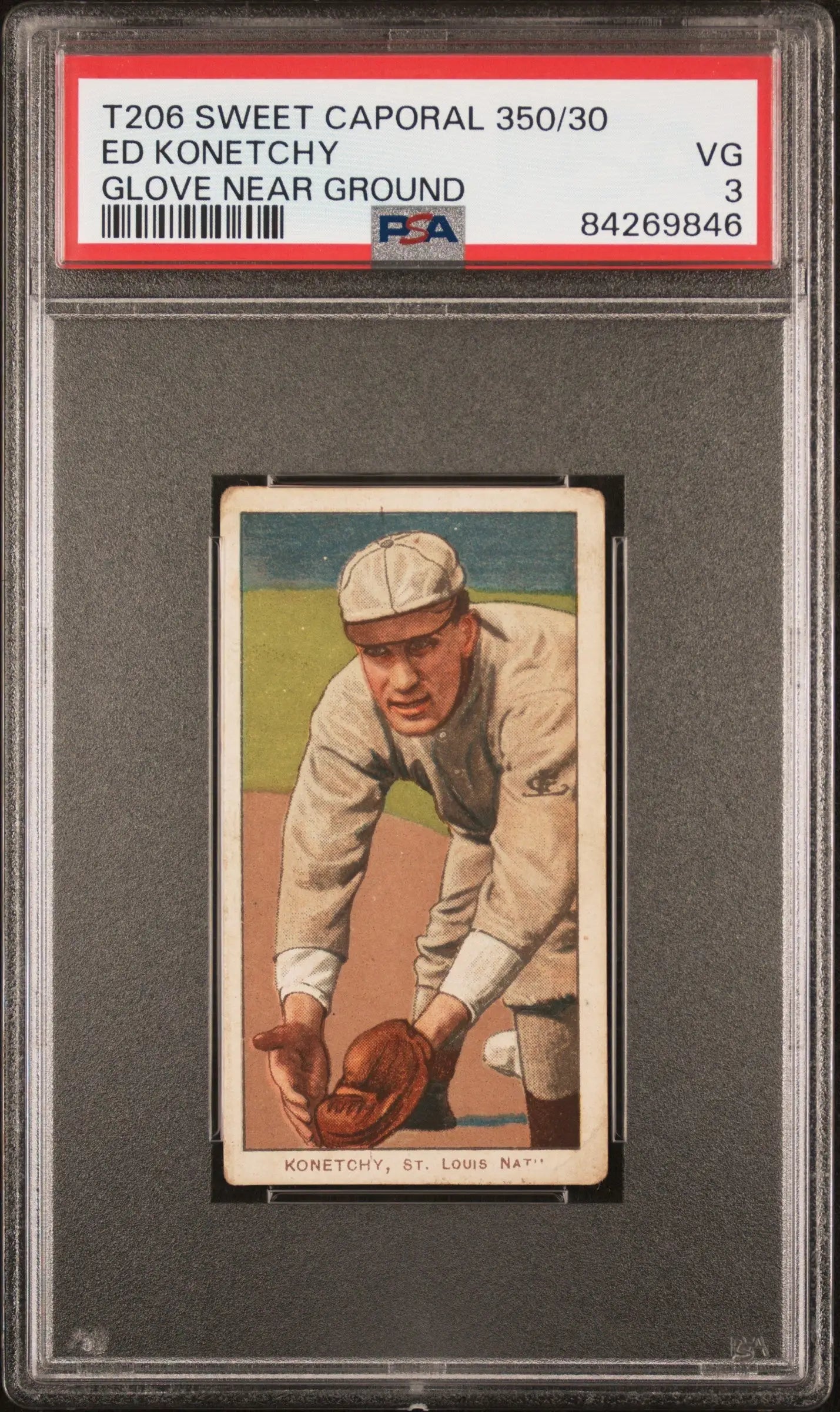 PSA-graded T206 Sweet Caporal Ed Konetchy baseball card in fielding pose with glove